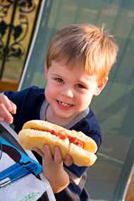Boy with a hot dog