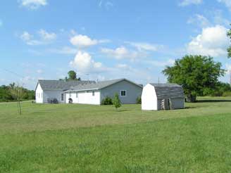 Our property from the back showing area where Septic system was installed