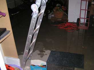 Our garage flooding during a rain storm