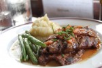 Delicious homemade Swiss steak, garlic green beans