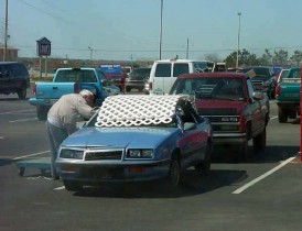 hauling on top of car