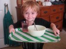 kid with mother's day breakfast