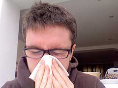 man-sneezing Man Sneezing