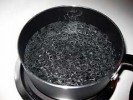 boiling water on a stove