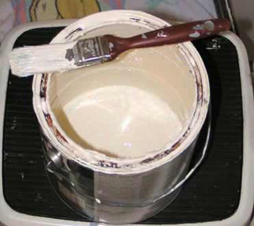 Use the leftovers at the bottom of "empty" paint cans to paint trim or to touch up
