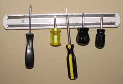 Storing kitchen tools on a magnetic knife holder