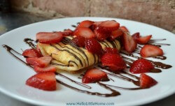 strawberries-and-cream-crepes-with-chocolate-sauce