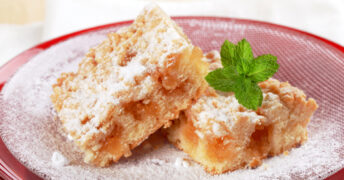 This super easy apple spice cake recipe makes a delicious spice cake perfect for get-togethers or sharing around the family table!
