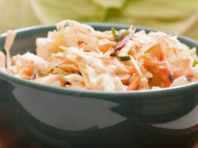 Sweet, creamy and light, this cole slaw is perfect for summer barbecues and get togethers. It also makes a great side for any summer meal like fried chicken, chicken fried steak or hamburgers and hot dogs! Try it and you and your family will agree that it is the best cole slaw ever!