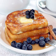 This is the BEST easy French toast recipe!! Sweet, crunchy and delicious, everyone will be begging for more! Perfect for holidays or anytime!
