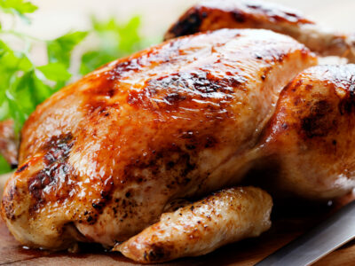 This easy roast chicken recipe makes moist, delicious chicken. Spend 5 to 10 minutes preparing it, add carrots and potatoes and you're done with dinner!