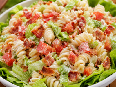 This BLT pasta salad recipe is creamy, crunchy and packed with crispy bacon, juicy tomatoes and tender pasta for the ultimate easy summer meal! Perfect for potlucks, BBQs, picnics and quick family dinners, this simple pasta salad tastes just like a bacon lettuce tomato sandwich in every delicious bite!