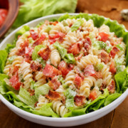 This BLT pasta salad recipe is creamy, crunchy and packed with crispy bacon, juicy tomatoes and tender pasta for the ultimate easy summer meal! Perfect for potlucks, BBQs, picnics and quick family dinners, this simple pasta salad tastes just like a bacon lettuce tomato sandwich in every delicious bite.