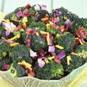 This easy broccoli raisin salad recipe makes a super tasty salad that is sure to please! This is my most favorite broccoli salad! It is the perfect blend of creamy, sweet and bacon flavors. Broccoli has never tasted so good! We make it as part of our holiday buffets and it is also a favorite when we bring to a party or get together!