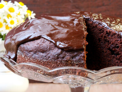This easy chocolate zucchini cake recipe is moist, chocolatey and oh so delicious! This recipe is easy to make with about 10 minutes' preparation. There can't be any better way to eat vegetables than with chocolate! Who knew that zucchini could be so good!