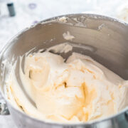 This easy buttercream frosting recipe is one of the best easy frosting recipes. Rich and delicious, it is perfect for frosting cakes, cupcakes, coffee cakes and more! With just 4 ingredients, it's easy to make in 5 minutes!