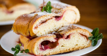 This easy coffee cake recipe is extra delicious because of its yummy fruit jam filling! It's easy to make as a cherry, strawberry, raspberry or blueberry coffee cake by just using different fruit filling! This tasty coffee cake is great for breakfast, special occasions or get togethers with family and friends!