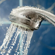 Here is an inexpensive homemade daily shower cleaner recipe you can use to reduce how often you have to clean the shower. It's easy to make with common ingredients!