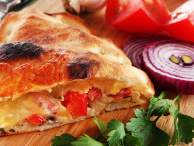 This homemade calzone recipe makes great calzones! You can make calzones for the entire family and everyone loves them! Homemade calzones are also a great option for get-togethers with family and friends! Set out a buffet and have each family member put whatever ingredients they want for their own personal homemade calzone.