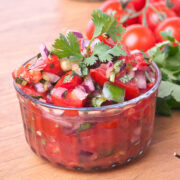 Save money with this delicious easy homemade salsa recipe! Fresh salsa is a tasty way to use all of those tomatoes, onions and peppers from your garden and this recipe makes it super easy!