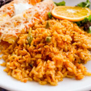 This Easy Spanish Rice Recipe makes a nice side dish to go with enchiladas and other Mexican food favorites. Serve with Refried Beans for a complete meal!