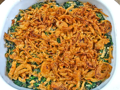Here's a delicious and easy spinach casserole recipe!&nbsp;This is a yummy comfort food recipe that my husband Mike has loved since he was a child. It is not as cheap as a lot of our recipes, but is so tasty, it's definitely worth it for a great side dish!