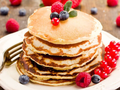 This yummy fluffy pancakes recipe is a great treat that's very easy to make. Add some fruit and whipped cream for a really special Christmas breakfast!