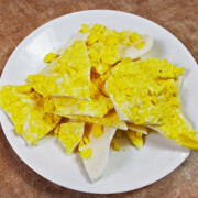 This easy lemon bark recipe makes a lemon and white chocolate Christmas candy recipe that is super tasty and easy to make, with just 2-3 ingredients! It's perfect for holiday parties and get togethers as part of a candy tray. Find this recipe and 25 of the best easy Christmas candy recipes including peppermint bark and lemon bark here!