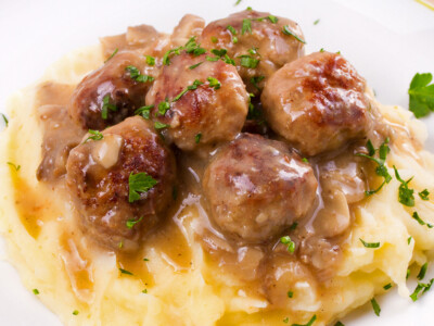 This meatball recipe with mushroom gravy is super easy comfort food to make that families love! Server it over mashed potatoes, rice or pasta along with a vegetable or salad and you'll have an easy and healthy meal that will definitely satisfy!