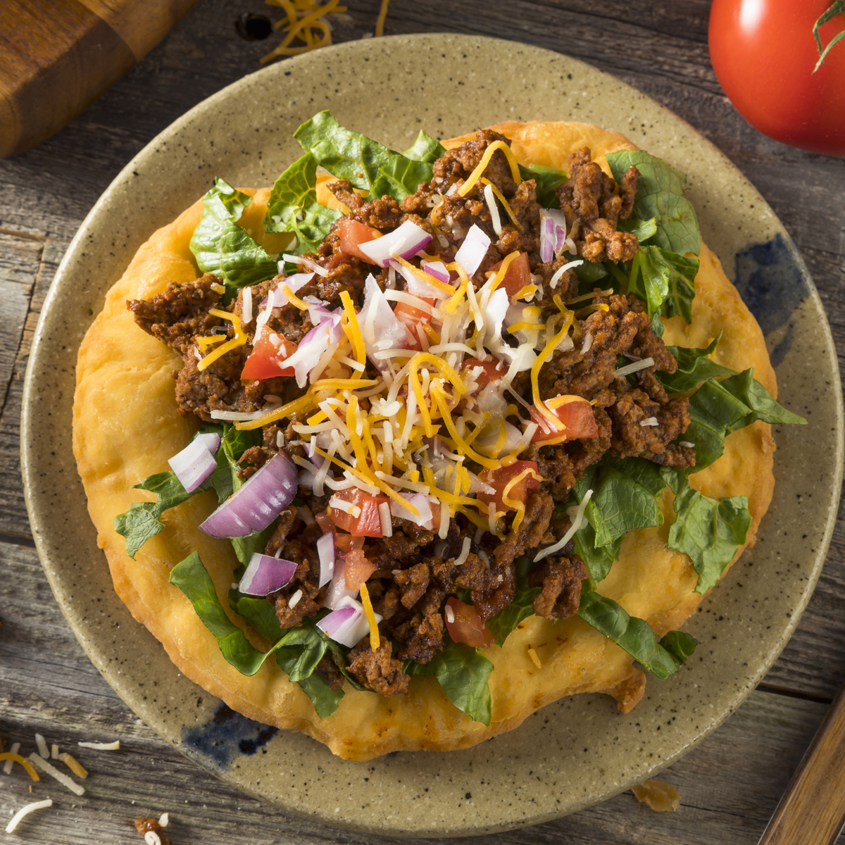 This easy Navajo Fry Bread Recipe makes a delicious fry bread that can be used to make Navajo Tacos, also called Indian Tacos. We like to make the tacos, but sometimes the kids just like to eat the fry bread with honey. Either way they are delicious!
