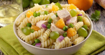 This easy pasta veggie fruit salad recipe makes a quick and delicious meal that’s perfect for a hot day. The salad features spiral pasta, tender chicken, crunchy celery, sweet green grapes, juicy mandarin oranges, crisp water chestnuts, and a mix of chopped green pepper and red onion. It's a vibrant, one-dish meal everyone will love. Prepare it in the morning, and when dinner time rolls around, just set it on the table—no fuss, no stress!