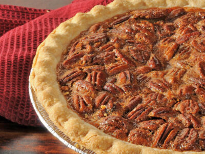 This Pecan cheesecake pie recipe makes a rich and delicious dessert with the gooey sweetness of pecans and the richness of cheesecake! You'll be surprised how easy it is to make a restaurant-quality dessert like this at home!