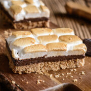 This easy S'mores bars recipe is an easy and delicious dessert recipe you can throw together in just 5 minutes and bake. It's a perfect dessert for summer picnics and it's also a great snack for kids!